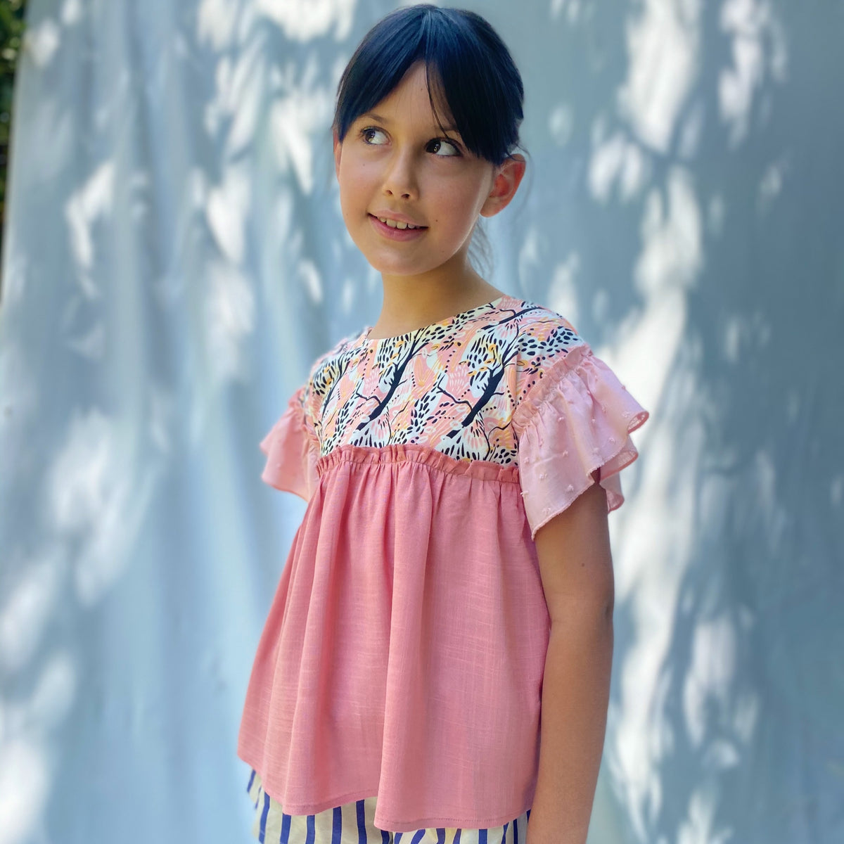 Polera Cosmos Rosa 8 años.