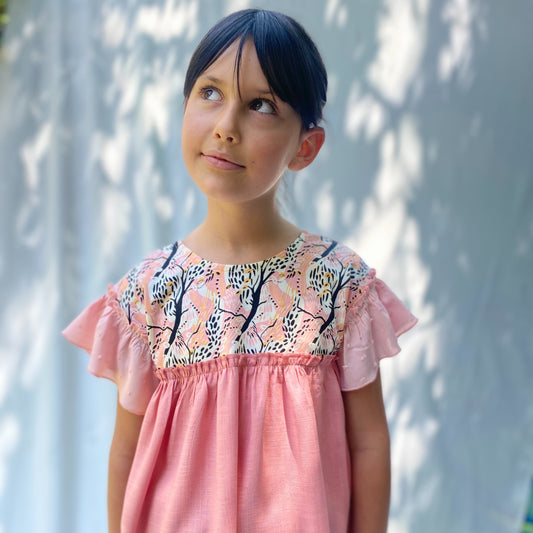 Polera Cosmos Rosa 8 años.