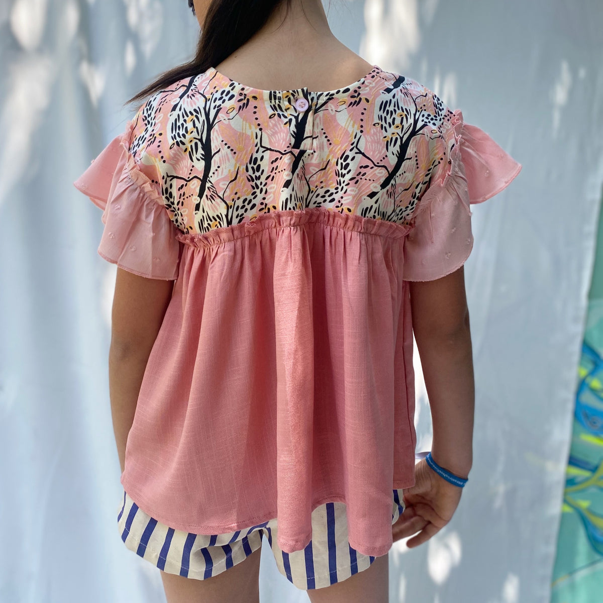 Polera Cosmos Rosa 8 años.
