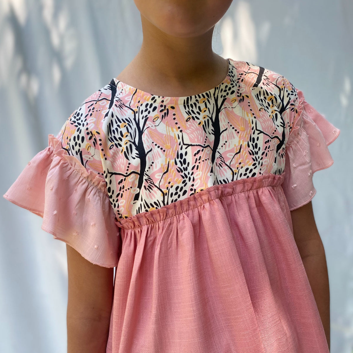 Polera Cosmos Rosa 8 años.
