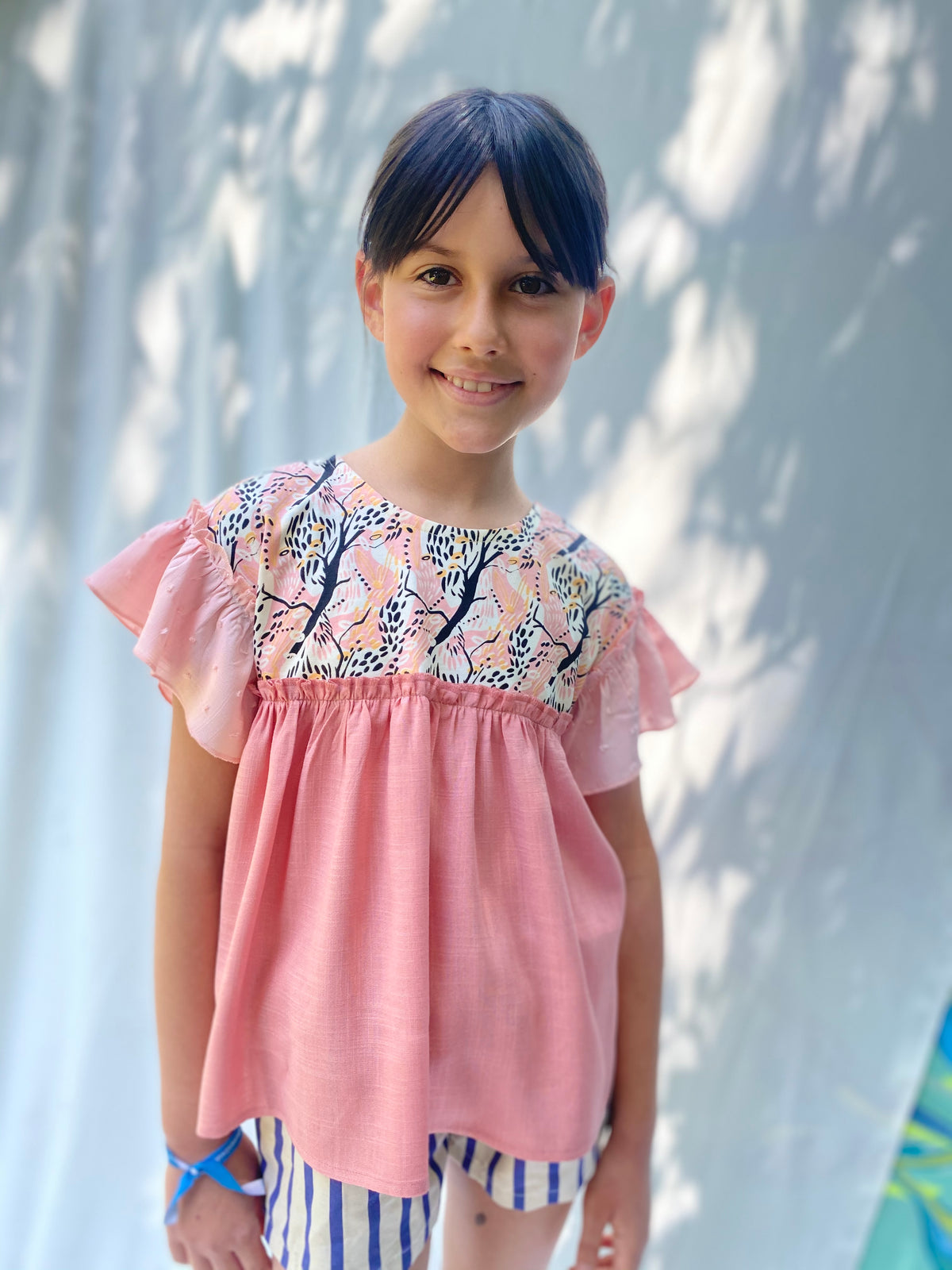 Polera Cosmos Rosa 8 años.